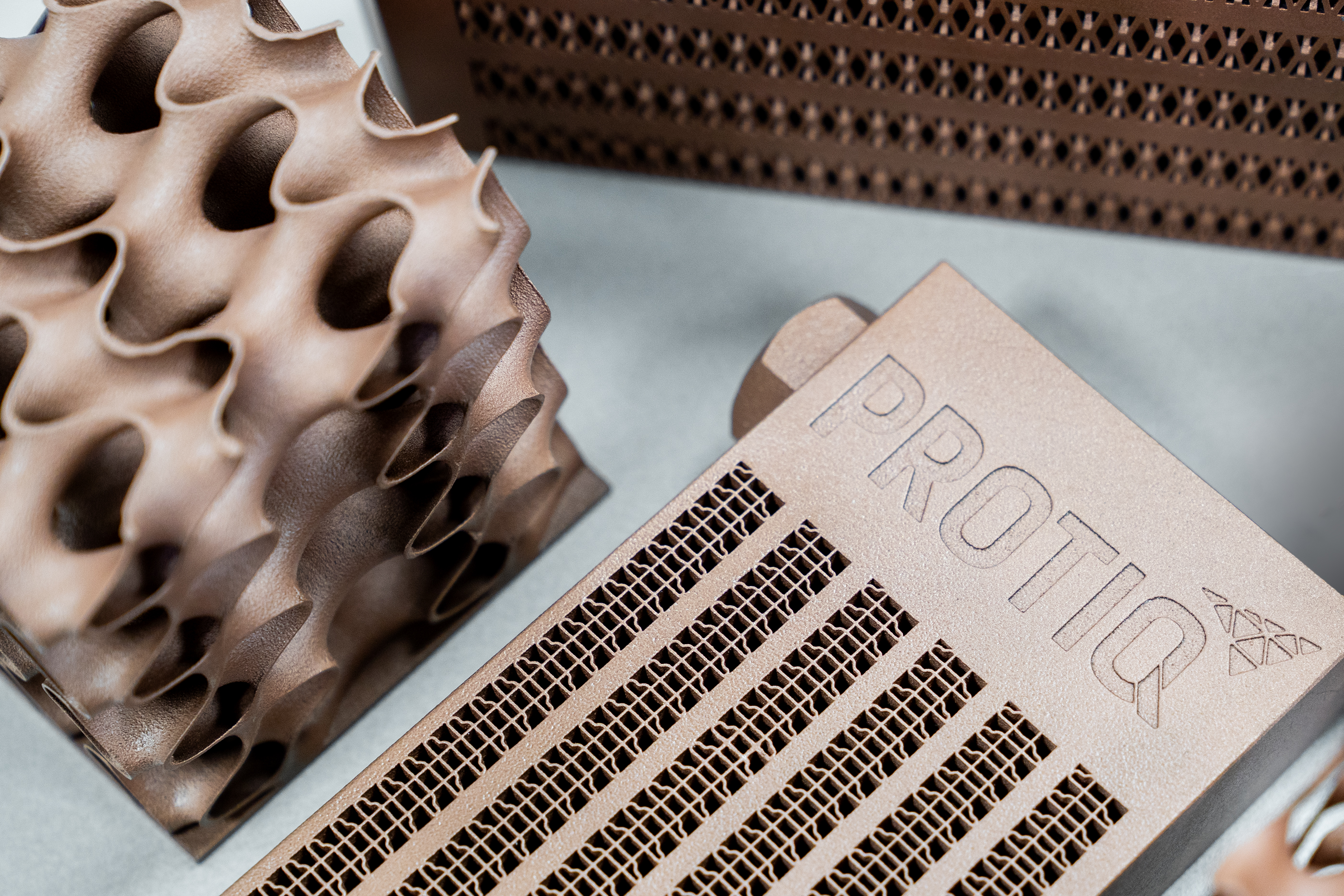 Several copper heat exchangers next to each other